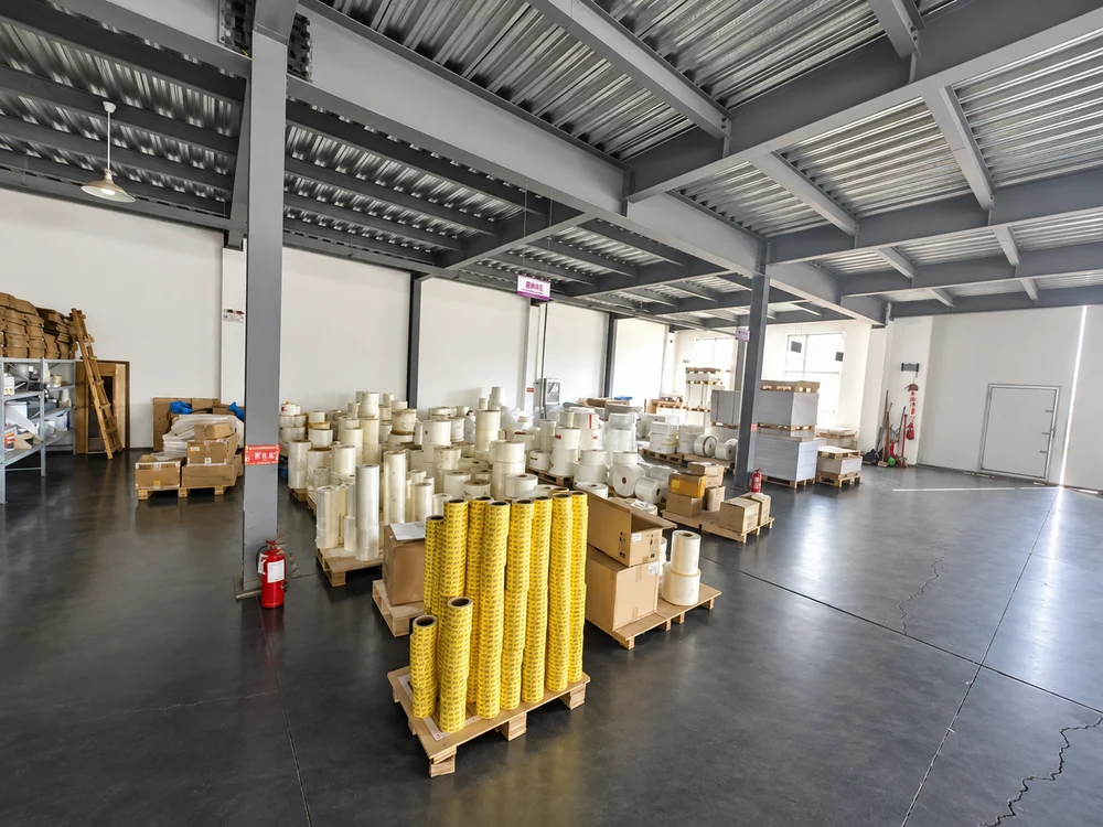 AI-retouched roll-material storage inside the manufacturing partner’s facility